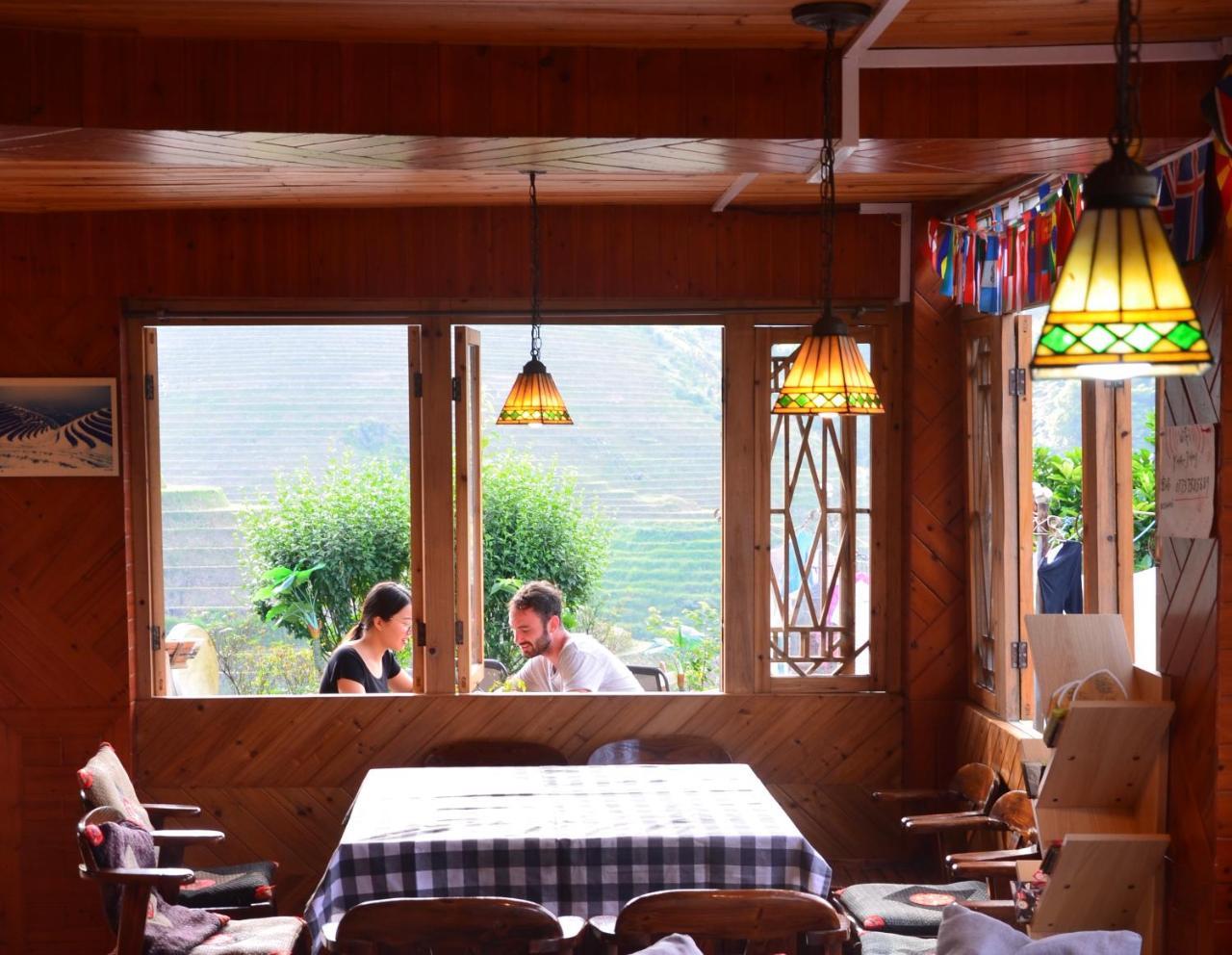 Dragon'S Den Hostel لونغشينغ المظهر الخارجي الصورة