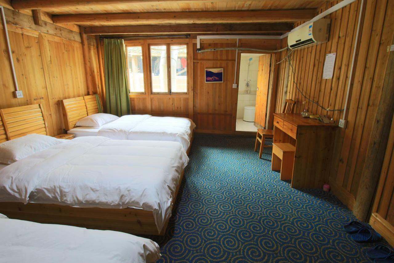Dragon'S Den Hostel لونغشينغ المظهر الخارجي الصورة