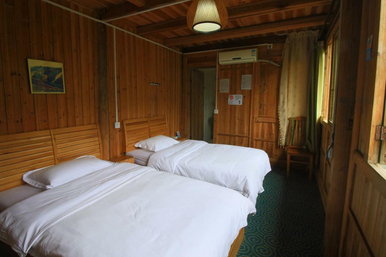 Dragon'S Den Hostel لونغشينغ المظهر الخارجي الصورة
