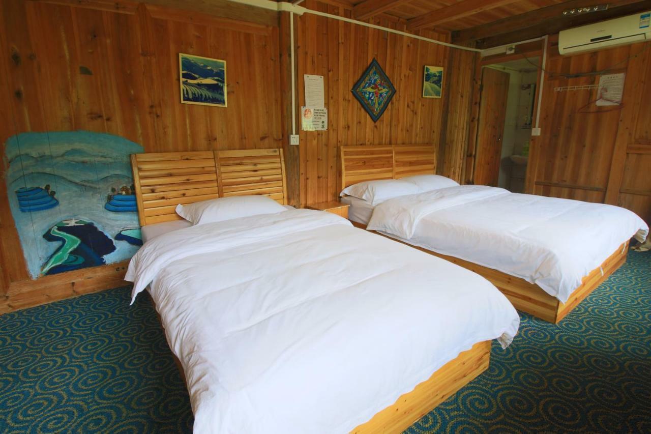 Dragon'S Den Hostel لونغشينغ المظهر الخارجي الصورة