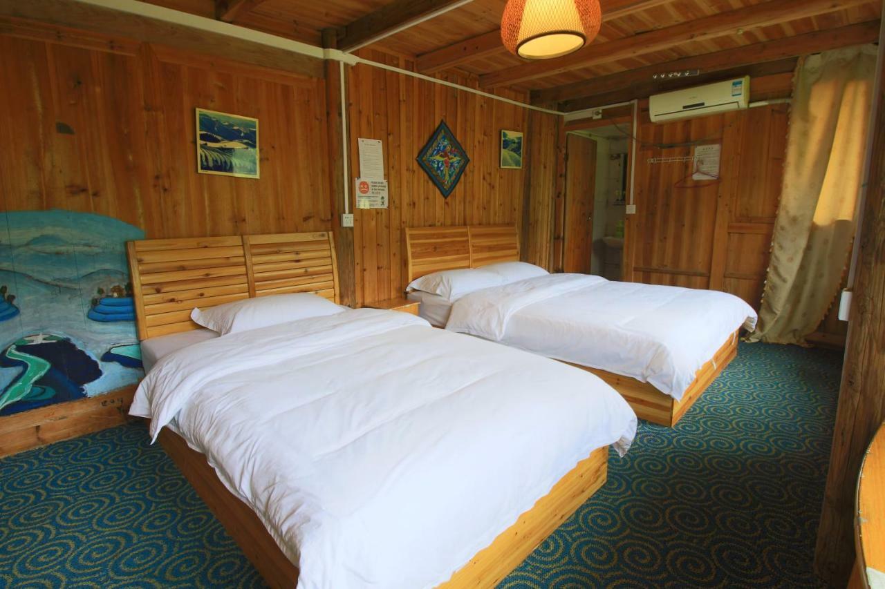 Dragon'S Den Hostel لونغشينغ المظهر الخارجي الصورة